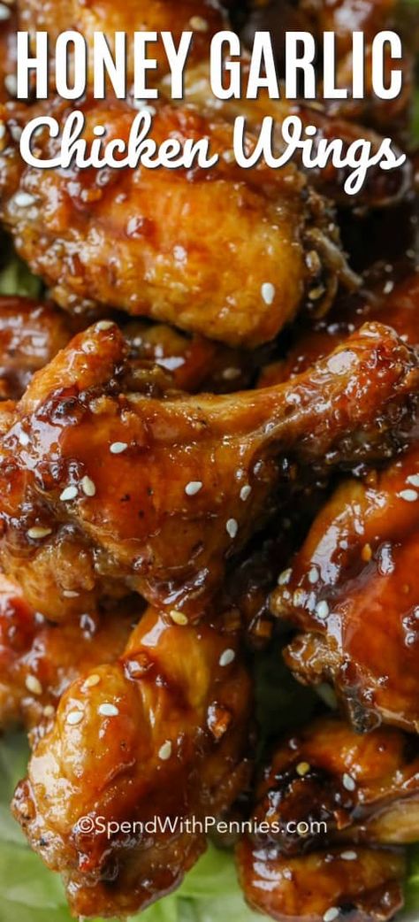 We cannot get enough of these Honey Garlic Chicken Wings! A sweet and slightly spicy sauce coats crisp chicken wings. And the best part is these wings are baked, not fried! #spendwithpennies #chickenwings #honeygarlic #bakedchickenwings #easyrecipe #easychickenwings #appetizer #chicken #withsauce #sweetandspicy #honeygarlicwings Wet Wings Recipe, Crisp Chicken Wings, Wings Recipe Oven, Chicken Wings Recipe Oven, Appetizer Chicken, Chicken Wing Sauce Recipes, Garlic Chicken Wings Recipe, Honey Garlic Wings, Crisp Chicken