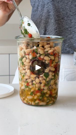 1.4M views · 9.4K reactions | These easy marinated white beans are my new favorite fridge staple! They’re layered with fresh flavors, perfect for adding a protein boost to your meals and creating light and healthy meals throughout the week.

#healthyfood #easyrecipes #vegetarianrecipes #glutenfree #glutenfreefood #proteinpacked | Downshiftology | Downshiftology · Original audio Antipasto Salad, White Bean Salad, Afternoon Snack, Heart Healthy Recipes, Veg Recipes, Side Recipes, Veggie Sides, Bean Recipes, White Beans