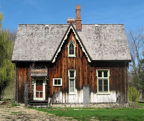 Common architectural design features Steeply pitched roof usually with steep cross gables Gables typically have decorated vergeboards Wall surface extended into gable without break Arched/pointed windows commonly extended into gables Prominent chimneys common 1840 – 1870 Gothic Revival Exterior, Gothic Victorian House Plans, Ontario Farmhouse, Gothic Revival Floor Plans, Carpenter Gothic House Plans, Gothic Revival House Plans, Gothic Arch Cabin, Gothic House Plans, Gothic Revival Cottage