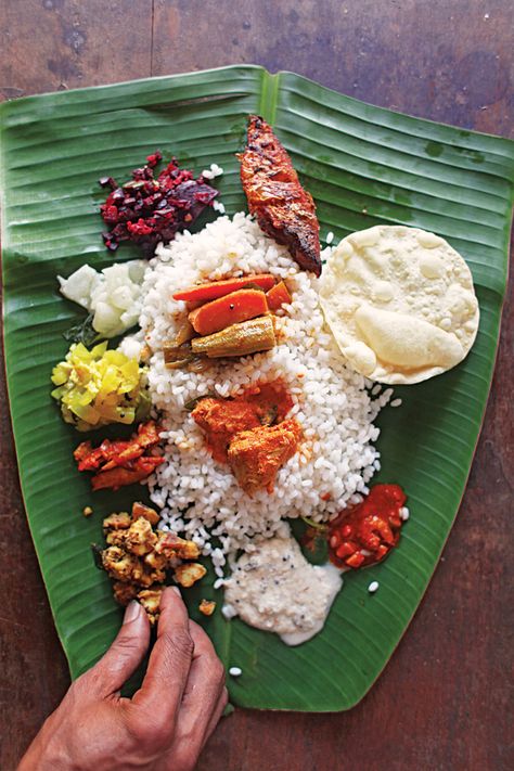 My in-laws' house in southwest India, on Kerala's coast, is normally very quiet. But whenever Jayanti, my mother-in-law Shyamala's cousin, is in town, it comes alive as the two women bond over cooking Kerala's most traditional dishes. Banana Leaf Food, Kerala Meals, Food Kerala, South Indian Vegetarian Recipes, Indian Food Photography, Capital Cities, Kerala Food, Traditional Dishes, Food Photography Tips