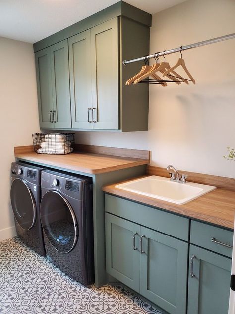 Laundry Room Sink In Middle, Laundry Room Ideas Countertops, Laundry And Kitchen Combo, Utility Room Hanging Rail, Utility Hanging Rail, Back Hallway Ideas Entrance Halls, Laundry Room Utility Sink Cabinet, Laundry Room With Wood Countertops, Wood Counter Laundry Room