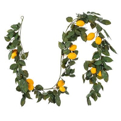 Vickerman 6' artificial green and yellow Salal leaf lemon garland featuring 52 branches with 14 lemons. This is a great finishing touch to any arrangement. This item is 6' tall from top to bottom and measures 72" H x 12" W x 12" L. The size of this garland makes it the perfect universal size to fit wherever you plan. It's lifelike leaves and delicate stems will give you the look and feel of a realistic artificial garland. Add color and greenery to any modern or traditional design. It features va Lemon Garland, Lemon Plant, Greenery Decor, Artificial Garland, Greenery Garland, Wreaths And Garlands, Leaf Garland, Green And Yellow, Elegant Homes