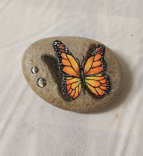 Monarch butterfly Monarch Butterfly Rock Painting, Butterfly Rocks, Butterfly Painting, Rock Painting Designs, Painting Designs, Painted Rock, Monarch Butterfly, A Rock, Rock Painting