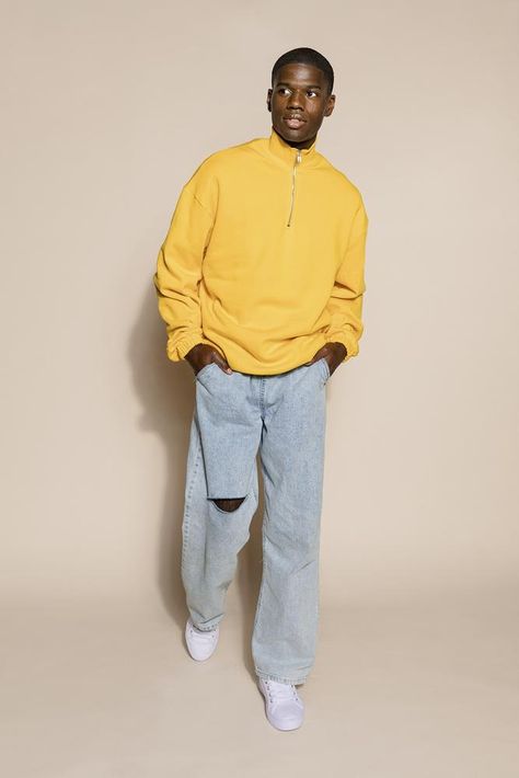 Handsome young man in yellow sweater and jeans | premium image by rawpixel.com / McKinsey Mens Blue Sweater Outfit, Blue And Yellow Outfit Ideas Men, Yellow Streetwear Outfit Men, Yellow And Grey Outfit Men, Yellow Sweatshirt Outfit Men, Yellow Fashion Men, Mens Yellow Outfit, Yellow Clothes Men, Yellow Outfit Aesthetic Men