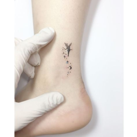 Peter Pan Tattoos, Bell Tattoo, Pan Tattoo, Playground Tattoo, Peter Pan Tattoo, Tattoo Diy, Foot Tattoos For Women, Cat Tattoos, Harry Potter Tattoos