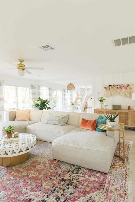 Tan Coach Living Room, Subtle Boho Living Room, Living Room Boho Colorful, Apartment Decorating Coastal Style, Colorful Boho Rug Living Room, Area Rug Aesthetic, Colorful Boho Design, Bright Living Room Rug, Girly Apartments Living Room