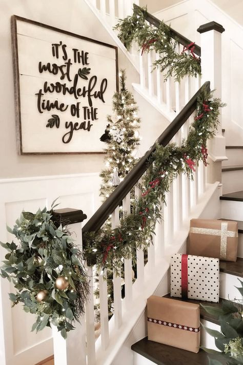 The Best Farmhouse Christmas Decor Inspiration - A huge collection of Farmhouse Christmas Decor inspiration that is completely on-trend, showcasing neutral color palettes with natural materials. #farmhousedecor #christmasdecor #farmhouse #farmhousechristmas #holidayfarmhouse #christmasfarmhousedecor #christmasdecoratingideas #xmasfarmhouse #holidaydecorations #christmasporch #holidaydecor #diychristmasdecor #christmasgarland #christmastabledecor #christmasdecorations #farmhousexmas #neutralchris Ideas Decoracion Navidad, Christmas Staircase Decor, Christmas Staircase, Stairs Ideas, Christmas Decor Inspiration, Christmas Tablescape, Staircase Railings, 12 December, Christmas Decorations Rustic