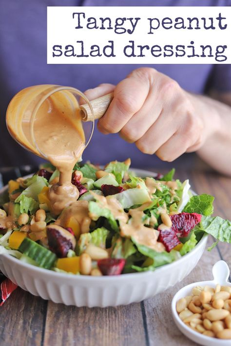 Salads are infinitely more interesting when a good dressing is involved. This peanut butter salad dressing comes together in just minutes. It’s a delicious homemade alternative to store-bought Thai peanut vinaigrette or bottled dressing. #peanutdressing #peanutbutter #vegansaladdressing Peanut Butter Vinaigrette, Peanut Vinaigrette Dressing, Peanut Butter Salad Dressing Recipes, Peanut Butter Salad Dressing, Bean Corn Avocado Salad, Potluck Dessert Recipes, Peanut Salad Dressing, Halloween Potluck Recipes, Peanut Butter Dressing