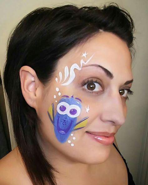 Dory. Finding Nemo Nemo Face Paint, Blacklight Paint, Disney Face Painting, Professional Face Paint, Cheek Art, Skin Paint, Face Paint Makeup, Kids Face Paint, Glitter Tattoo