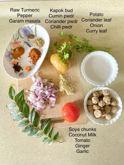 Ingredients -Soya Chunks,Coconut milk,Kapok Bud,Cumin-Coriander-Chilli-Garam masala Powder,Tomato,Ginger,Garlic,Potato,Coriander Leaf,Onion,Raw Turmeric,Black Pepper,Curry Leaf, Method - 1. Soak soya chunks in boiling water for 20 mins-drain-squeeze & wash 2. In a pan add oil-fry Kapok bud,onion,curry leaf,chilli,Ginger,Garlic,Tomato,all powders,pepper 3. add soya-stir well-add potato,coriander leaves 4. add little water to cook-add in coconut milk-when reach to boil remove from heat. Done! Onion Curry, Raw Turmeric, Soya Chunks, Curry Leaf, Turmeric Black Pepper, Garlic Potatoes, Gravy Recipe, Coriander Leaves, Gravy Recipes