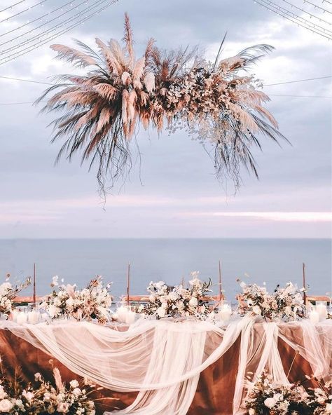 These romantic wedding drapes are giving us all the warm fuzzies with their whimsical swoops, and dramatic floral installations - from grand centrepieces to that stunning floating chandelier. Professional Planner, Beach Wedding Pink, Minimalist Dekor, Flowers And Greenery, Wedding Spot, Beach Wedding Decorations, Wedding Forward, Salou, Head Table