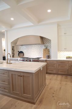 All Oak Kitchen, Matching Floors And Cabinets, White Cabinets With Taupe Island, Mohawk Millport Hickory, Master Bed Closet Ideas, Stone Fireplace Family Room, Track Home Kitchen Remodel, Flat Island Kitchen, Grand Traditions Homes