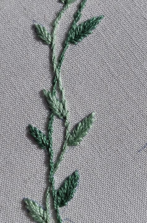 Hand embroidered interlacing vines with leaves Embroidered Leaf Pattern, Vines Embroidery Pattern, Oak Leaf Embroidery Pattern, Simple Vine Embroidery, Flower And Leaves Embroidery, Embroidered Ivy Leaves, Embroidered Vines And Leaves, Hand Embroidered Leaves, Hand Embroidery Vines