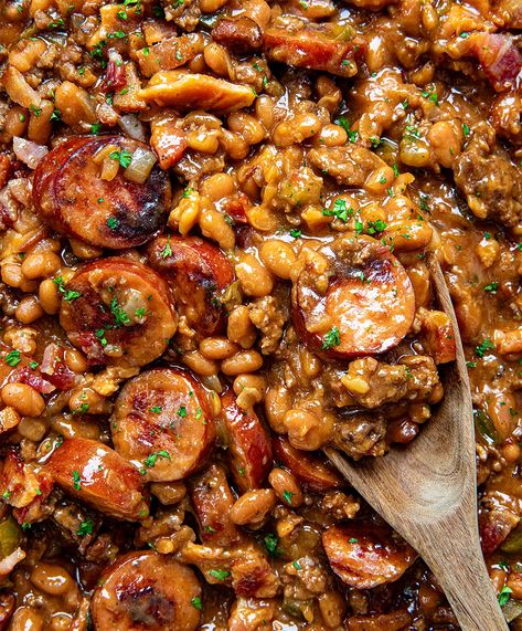 Delicious and savory Kielbasa Cowboy Beans recipe loaded with kielbasa, ground beef, bacon, and baked beans. Perfect for a hearty meal! Beef Kielbasa Recipes, Cowboy Beans Recipe, Kilbasa Sausage Recipes, Cowboy Recipes, Beef Sausage Recipes, Cowboy Baked Beans, Andouille Sausage Recipes, Bean Dishes, Homestead Recipes