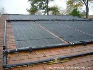 Solar panels attached to roof to heat the swimming pool Solar Pool Heater, Solar Roof Tiles, Pool Heaters, Solar Heater, Building Remodeling, Solar Power Panels, Solar Pool, Solar Energy Panels, Pool Heater