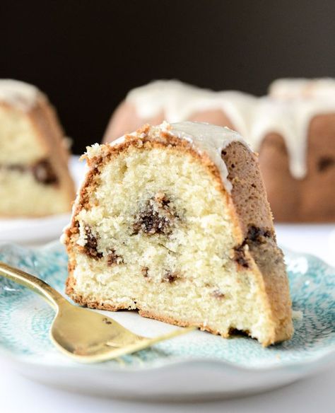 sour cream coffee cake with brown butter glaze I howsweeteats.com Amaretto Cake Recipe, Coconut Bundt Cake, Brown Butter Glaze, Amaretto Cake, Butter Glaze, Sour Cream Coffee Cake, Almond Flavor, Toasted Coconut, How Sweet Eats