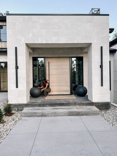 Modern entry, porch inspo, crate and barrel, planter Crate And Barrel Sphere Planter, Modern Front Door Lighting, Modern Front Entrance Exterior Design, Modern Portico Entrance, Entrance Outdoor Design, Modern House Entrance Door, Metal House Exterior, Modern Front Door Entrance, Modern House Front Door