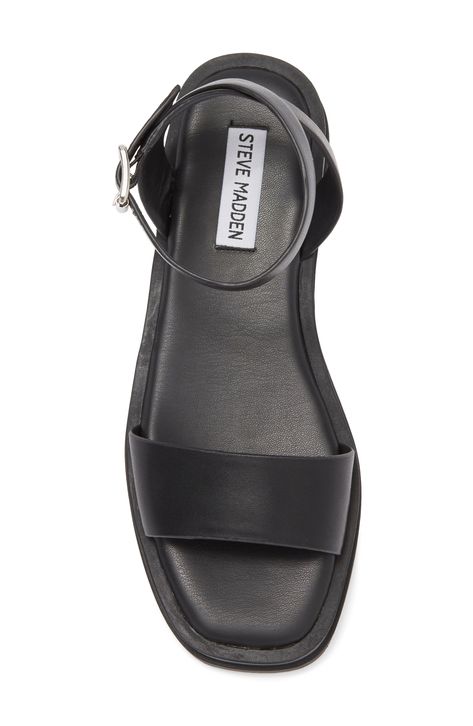 An angular square toe ups the mod factor of an essential flatform sandal set on a molded footbed. 1" platform Leather upper/synthetic lining and sole Imported Black T-strap Sandals With Leather Footbed, Black Synthetic T-strap Sandals, Black T-strap Sandals With Leather Sole, Black T-strap Sandals With Flat Leather Sole, Black Synthetic Flat T-strap Sandals, Flatform Sandals, The Mod, Black Leather Sandals, Sandal Women