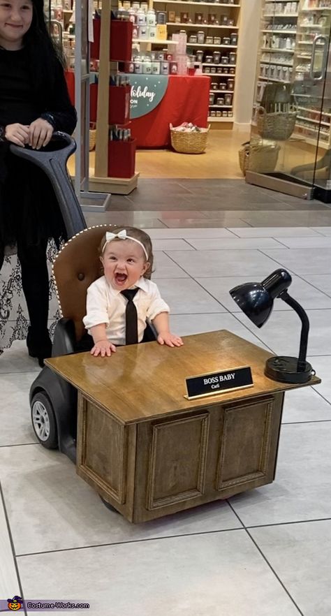 Dana: My 14 month old daughter Carli is Boss Baby! We wanted to create a costume that was mobile so my husband built an executive style desk around Carli’s step 2... Boss Baby Halloween Costume, Boss Baby Costume, Cars Halloween Costume, Baby Trunks, Executive Style, Push Cart, Baby Halloween Outfits, Baby Boss