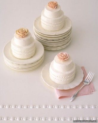 Miniature Rose Cakes: Simple designs, like the luscious buttercream blooms atop these tiny cakes, can make a big impression. Just three inches high, these beauties could be the highlight of a dessert buffet or served at each place at a shower. Individual Wedding Cakes, Buffet Dessert, Bridal Shower Desserts, Mini Wedding Cakes, Tiny Cakes, Wedding Cake Roses, White Cakes, Individual Cakes, Shower Desserts