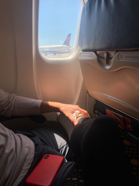 boyfriend holding his girlfriends ankle, while they sit and wait for the plane to departure Couple On Plane Pictures, Plane Aesthetic Couple, Couples In Airport, Couple Travel Photos Airport, Couple On Plane, Airport Couple Aesthetic, Couple Plane Aesthetic, Travel Couple Aesthetic, Couple Travel Aesthetic