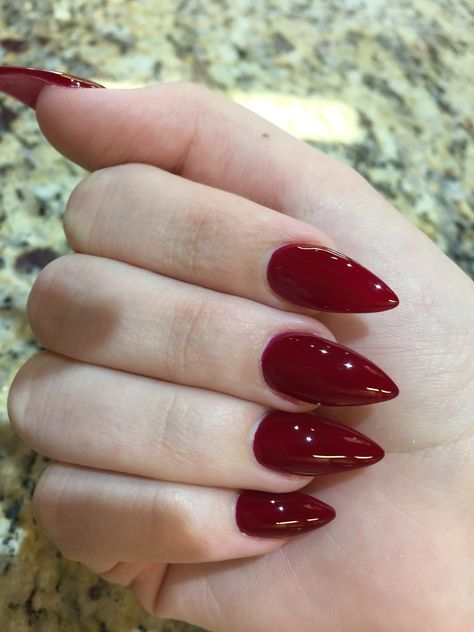 #30. Elvira: Stiletto acrylic nails with deep red polish. (World Nails Spa, Clarksville, TN) Deep Red Stiletto Nails, Wine Red Stiletto Nails, Dark Red Nails Long, Elvira Nails, Red Polish Nails, Deep Red Nails Acrylic, Stiletto Red Nails, Red Nails Stiletto, Stiletto Nails Red