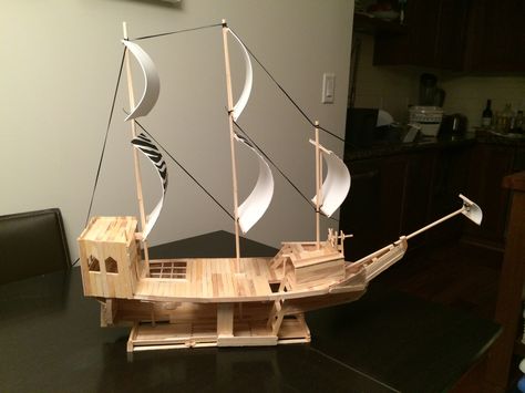 Angle #2 - Pirate ship made out of popsicle sticks, wooden dowels and some foam! Does not float on water but the bottom half is exposed to allow figurines to play under the deck. Hours of fun for kids. Ship Papercraft, Popsicle Stick Boat, Greek Ship, Kids Pirate Ship, Kids Boat, Popsicle Stick Crafts House, Ice Cream Stick Craft, Popsicle Stick Houses, Diy Popsicle Stick Crafts