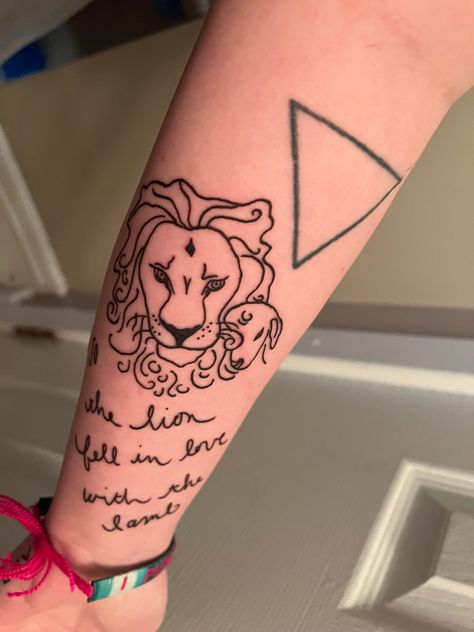 Twilight inspired tattoo of the lion and the lamb Twilight Tattoos, The Lamb, The Lion, Fell In Love, Tattoos And Piercings, Triangle Tattoo, Geometric Tattoo, Falling In Love, Tattoo Ideas