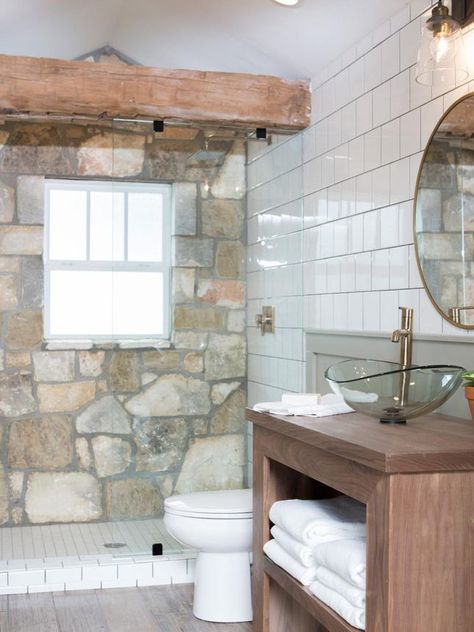 Stone from the house's old exterior is used to line a bathroom wall. Raleigh Homes, Bathroom Joanna Gaines, Joanna Gaines Bathroom, Magnolia Market Joanna Gaines, Fixer Upper Bathroom, Simple Bathroom Designs, Bathroom Paint Colors, Chip And Joanna Gaines, Bowl Sink