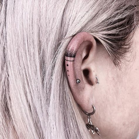 Subtle Lines And Dots Ear Tattoo Ear Lobe Tattoo, Inner Ear Tattoo, Sewing Tattoos, Bodysuit Tattoos, Behind Ear Tattoos, Ear Tattoo Ideas, Ring Finger Tattoos, Tattoo Trend, Dot Tattoos