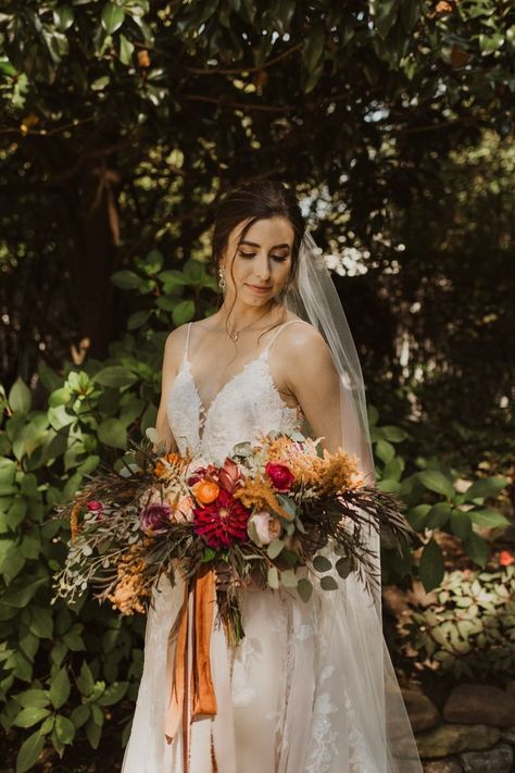 Bouquet Goals! Click to see one of my all time favorite fall wedding bouquets from Enchanted Florist. The shape, the colors, the blooms, THIS COUPLE. It's all just perfect. // Photography: Finding Eden Photo // Venue, Planning & Design: CJ’s Off the Square Moody Garden Wedding, Mauve And Orange, Wedding In Fall, Moody Garden, Wedding Ceremony Chairs, Moody Modern, Modern Boho Wedding, Fall Garden Wedding, Enchanted Florist