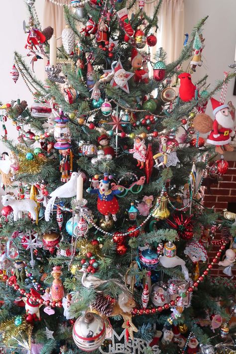 Christmas Tree Maximalist, Better Homes And Gardens Christmas, Toy Christmas Tree Theme, Funky Christmas Trees, Playroom Christmas Tree, Non Traditional Christmas Tree, Family Christmas Tree, Eclectic Christmas Tree, Ugly Christmas Tree