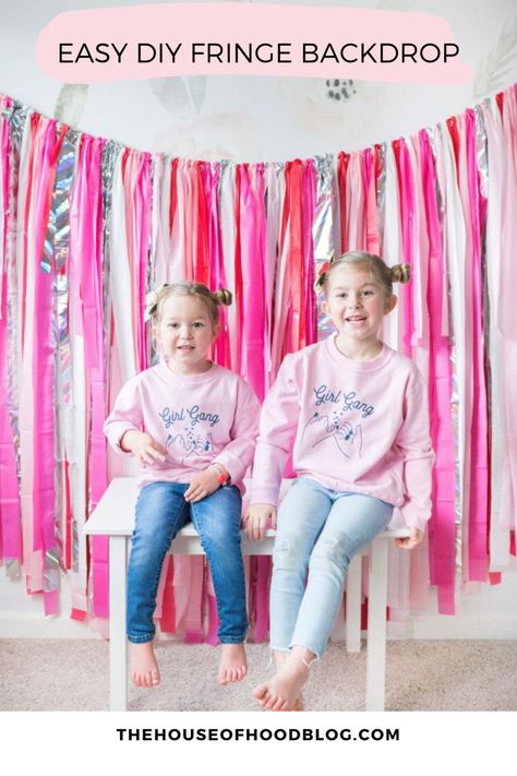 I have been wanting to make a tablecloth fringe backdrop for so long! It took me about 2 hours and was actually pretty relaxing to make! This easy DIY fringe backdrop will only set you back about $11. I ended up picking up table cloths from a few different stores. The Dollar Tree, Walmart, and Hobby Lobby. They ended up being all very comparable in quality. Diy Fringe Backdrop, Tablecloth Backdrop, Diy Fringe, Diy Tablecloth, Table Cloth Decorations, Fringe Backdrops, Diy Backdrop, Party Backdrop, Pink Valentines