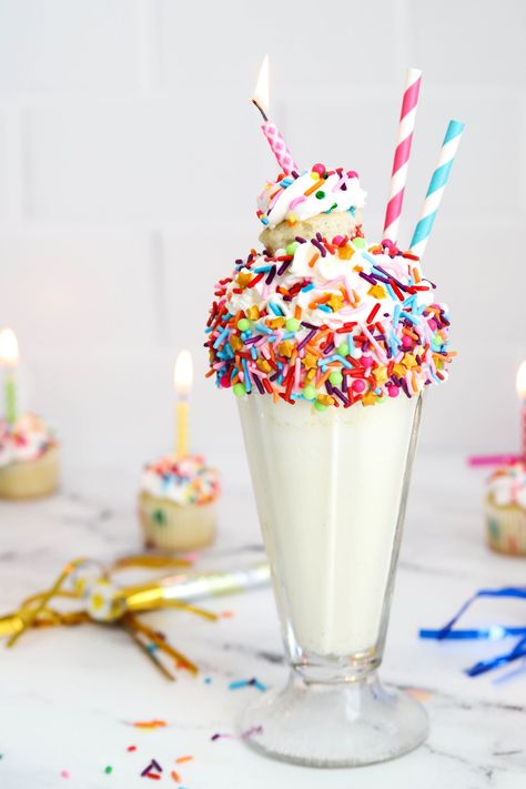 This Birthday Cake Milkshake might just be my best milkshake recipe yet! With the delicious taste of cake batter and loaded with sprinkles and a cupcake, this fun dessert recipe will be your new favorite too! Birthday Cake Shake, Birthday Cake Milkshake, Cake Milkshake, Cake Shake, Fruit Milkshake, Healthy Birthday, Best Milkshakes, Fun Dessert, Birthday Breakfast