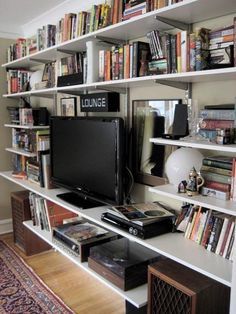 Track Shelving, Bookshelves With Tv, Elfa Shelving, Bookshelves In Bedroom, Entertainment Center Shelf, Retreat Ideas, Bookcase Wall, Entertainment Center Decor, Romantic Bedroom