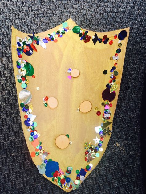 How to Make Knight’s Shield! #SENResourcesSummer – Special Educational Needs Resources Blog Knight Shield Diy, Diy Knight Shield, Knight Crafts For Preschoolers, Shield Craft Preschool, How To Make A Shield, Knight Shield Craft, Fairytale Crafts For Toddlers, Shield Craft For Kids, Royalty Crafts