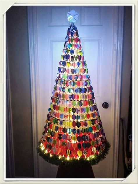 Christmas tree of dart flights Dart Flights, Darts Game, Wine Corks, Bar Ideas, Wine Cork, Dart, Cork, Flight, Merry Christmas