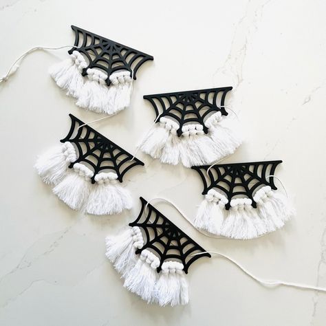 Spiderweb Macrame Garland - sonder and wolf Halloween Spiderweb Decorations, Macrame Spider Web, Macrame Halloween Decor, Halloween Macrame Wall Hanging, Fall Macrame Ideas, Macrame Bat, Spiderweb Macrame, Halloween Macrame, Halloween Macrame Rainbow