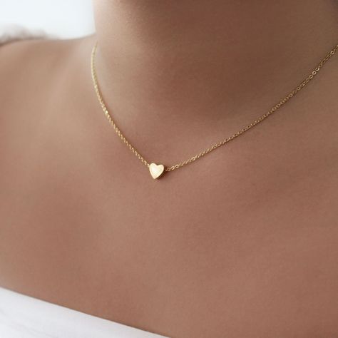 Dainty Heart Pendent Necklace - This listing is for a pair of the Dainty Heart Pendent Necklace. Perfect for every day and layering.- Base Material: High Quality Stainless Steel- Finish: 18K Gold - Length: 16" + 2" extender - Measurements: Heart - 7mm/7mm - Nickel Free and Tarnish Free- All our jewelry is packaged in gift ready boxes. If you would like multiple items from your order packaged separately please let us know!© 2023 Generation of Daughters Stainless Steel Heart Necklace, Gold Chain With Heart Pendant, Small Pendant Necklace Gold, Pendent Gold, Heart Pendent, Gold Pendent, Gold Heart Pendant, Pretty Jewelry Necklaces, Glamour Nails