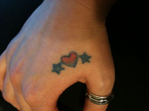 Simple tattoo Tattoo Near Thumb, Finger Pointing Tattoos, Below Thumb Tattoo, Butterfly On Thumb Tattoo, Hand Tattoo Between Thumb And Pointer, Tattoo Between Thumb And Index Finger, Bat Tattoo On Finger, Thumb Tattoos, Sweet Tattoos