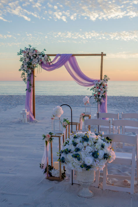 Pink sunset beach wedding in Florida Tangled Beach Wedding, Lavendar Wedding Beach, Beach Wedding Lilac, Beach Wedding Purple Theme, Pink And Blue Beach Wedding, Colourful Beach Wedding, Purple Beach Wedding Ideas, Lavender Beach Wedding, Purple Beach Wedding