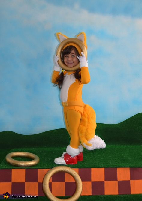 Sara: Growing up in the 90's, SEGA was all the rage. Sonic and Tails was the most addicting game, right?! I feel everyone can point out the characters from a mile... Tails From Sonic Costume, Tails Costume Sonic, Tails Costume Diy Sonic, Sonic Family Halloween Costumes, Sonic Tails Costume, Sonic The Hedgehog Halloween, Tails Costume, Sonic Costumes, Sonic Cosplay