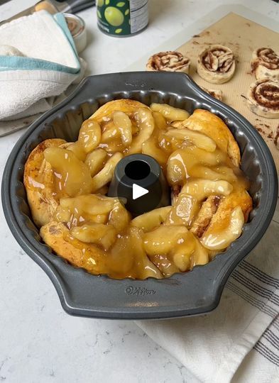 619K views · 8.4K reactions | easy one-pan dessert | easy one-pan dessert

Kim makes a yummy one-pan breakfast using cinnamon rolls. | By Charles Parks | Take cinnamon rolls place it in
the bottom of your bump cake pan the eight pack of cinnamon
rolls and they'll just go perfectly around here then you're going to take a
pack of the grand which is five you're going to put them on the
side and you kind of want to flatten
them out I guess a little bit all the dough won't be right in
one area but this will rise up so it's it's okay okay now
you're going to put it in the oven or get preheated at three
fifty for about 25 minutes. Look at that. Oh yummy. Turned
up really nicely. Okay. Mm. Take some apple pie filling.
Mhm. We're going to put it right here on top of these
cinnamon and you're done. Apple Pie Filling Cinnamon Rolls Pillsbury, Cinnamon Roll Pie Filling Dessert, Apple Cinnamon Rolls Pillsbury, Apple Bunt Cake, Cinnamon Roll Apple Pie, Apple Pie Filling Recipes, Pillsbury Cinnamon Rolls, Canned Apple Pie Filling, Peach Pie Filling