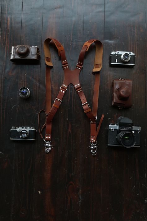 Handcrafted item, we spent around 7hrs to craft each camera harness. All items tested before shipping In this harness model we use an additional strap to enhance the straps area, so that your shoulders get less tention during shooting. Using two Camera Leather Strap will help you concentrate on the shooting process, free the neck and hands from constantly loading. Leather camera strap create an ideal and comfortable shape on the back, and the leather center part distributes the load evenly.  Camera harness is suitable for photographers of all levels, for all types of shooting: weddings, sports events, reportage shooting, etc. DSLR Camera Strap can be used with any mirror and mirrorless cameras, as we use universal screws. Dimensions of leather camera shoulder strap can be adjusted, and als Leather Camera Harness, Frozen Ocean, Camera Harness, Dslr Camera Straps, Leather Camera Strap, Camera Straps, Camera Strap, Mirrorless Camera, Dslr Camera