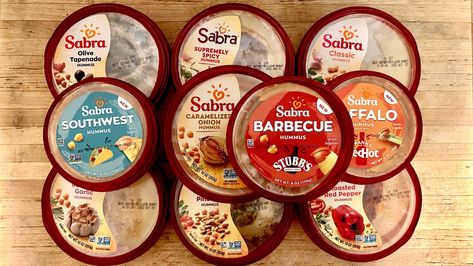 10 Sabra Hummus Flavors, Ranked - The Daily Meal Buffalo Hummus, Hummus Brands, Hummus Sauce, Sabra Hummus, Hummus Flavors, Roasted Garlic Hummus, Garlic Hummus, Tahini Paste, Roasted Red Pepper Hummus