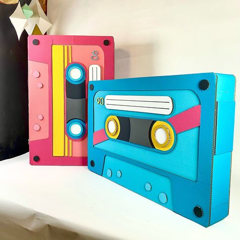 Gigantic Paper Music Cassette Music is life… 🎶 Made of cardboard and painted in vivid shades of pink and blue, this pair of music cassettes looks fantastic! Look our paper artist sit beside the cassettes! The paper cassette is real huge! 🎵🎨 Let paper art decorations take the event to the next level! Anything you can dream about is possible with DH Paper! DM us for more information or explore more at www.doraharun.com #DHPaperArt #DoraHarun #PaperArt #musiccassette #commercialartist #pape... Artist Zine, Paper Cassette, Reading Month, Music Cassette, Paper Artist, Shades Of Pink, Music Is, Art Decoration, Music Is Life