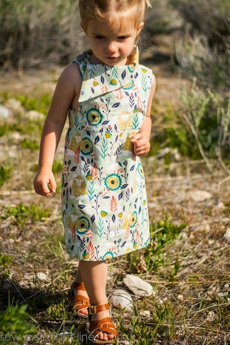 Love the asymmetrical collar - Fresh Bloom Frock by Blank Slate Patterns sewn by Sew a Straight Line - Girls dress sewing pattern Frock Designs For Kids, A Line Frock, Bloomers Sewing Pattern, Toddler Clothes Patterns, Long Frocks For Kids, Linen Suits Women, Melly Sews, Frocks For Kids, Asymmetrical Collar