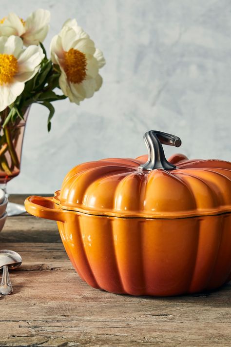 Inspired by a timeless fairy tale design and the brilliant colors of autumn, the Le Creuset Pumpkin Cocotte is a delightful seasonal addition to your kitchen and table. With its unique ribbed design and hand sculpted stainless steel figural knob, the versatility of this pot makes it ideal for everything from comforting soups and stews to braising, Halloween baking and more. Roast Chicken Sauce, Pumpkin Cocotte, Pumpkin Casserole, Bread Roast, Induction Oven, Enameled Cast Iron Cookware, Comfort Soup, Sauce For Chicken, Cast Iron Dutch Oven