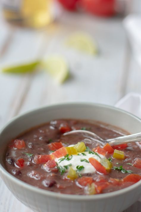 Black Bean Ham Soup is a great way to use leftover ham, but the meat can be left out for a delicious vegetarian version. Black Bean Soup With Ham, Black Bean And Ham Soup, Bean Soup With Ham, Bean And Ham Soup, Soup With Ham, Creamy Tomato Basil Soup, Potato Soup Easy, Sweet Potato Biscuits, Beans Recipes