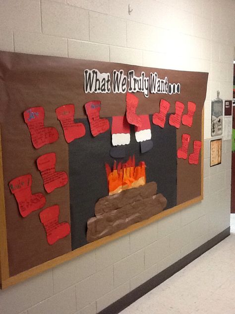 Students wrote Christmas wishes that were not things on their stockings. Fireplace Bulletin Board, Bulletin Board Tree, Holiday Bulletin Boards, Christmas Bulletin Boards, Work Bulletin Boards, Classroom Christmas Decorations, Winter Bulletin Boards, Classroom Doors, Christmas Bulletin Board